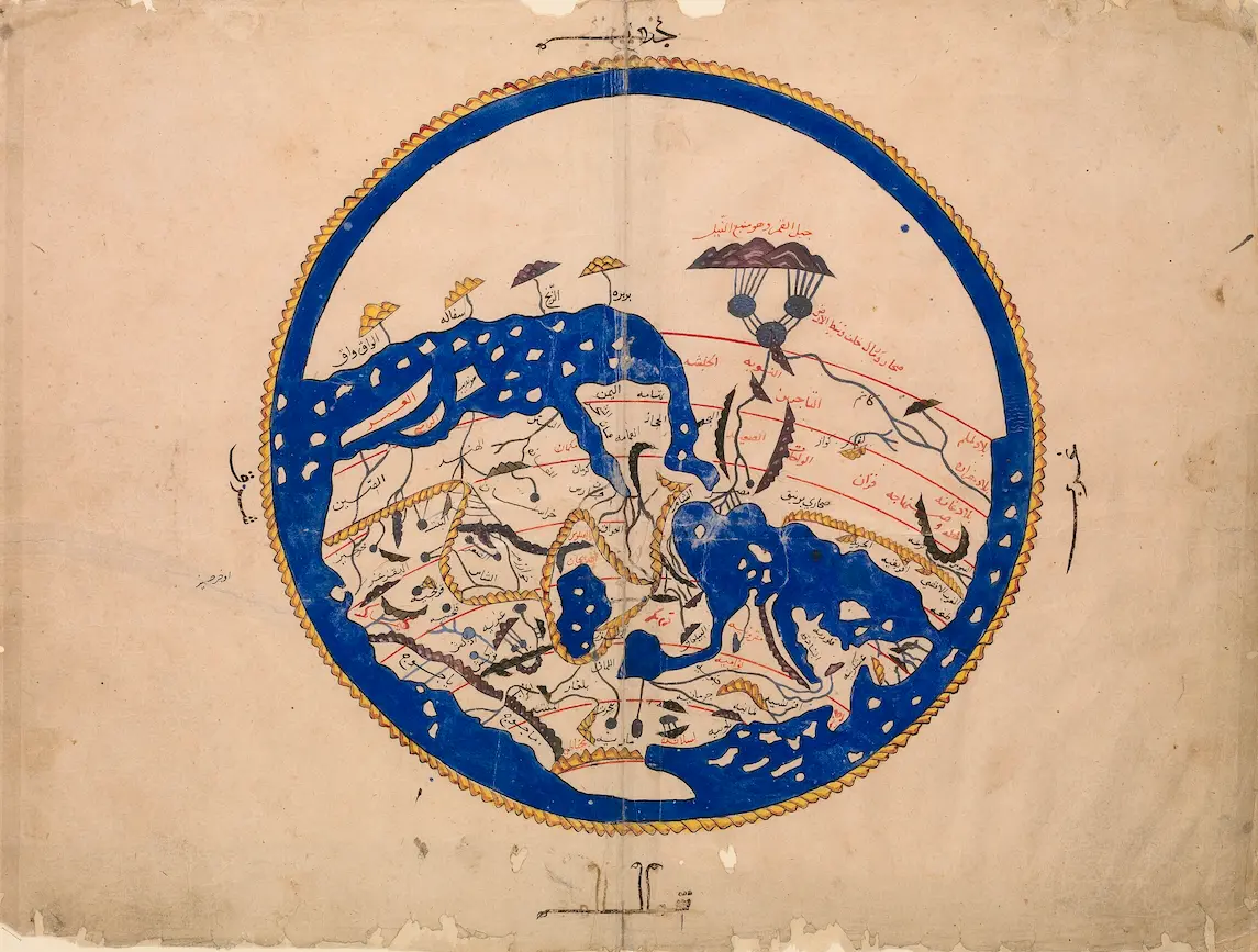 Illuminated manuscript with gold leaf and gothic calligraphy on aged parchment